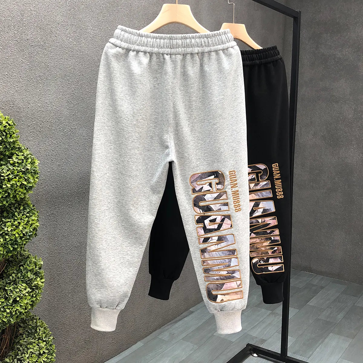 Custom logo stitching drawstring letters casual horn for men and women trousers flare Sweatpants